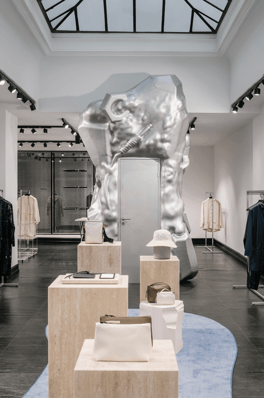 Rains juxtaposes art and design with new Paris store - ect.studio